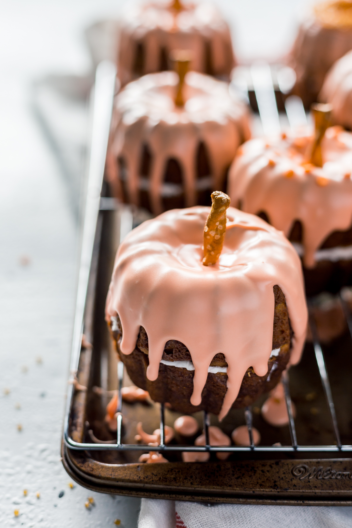 Mini Pumpkin Bundt Cakes with Cheesecake Filling