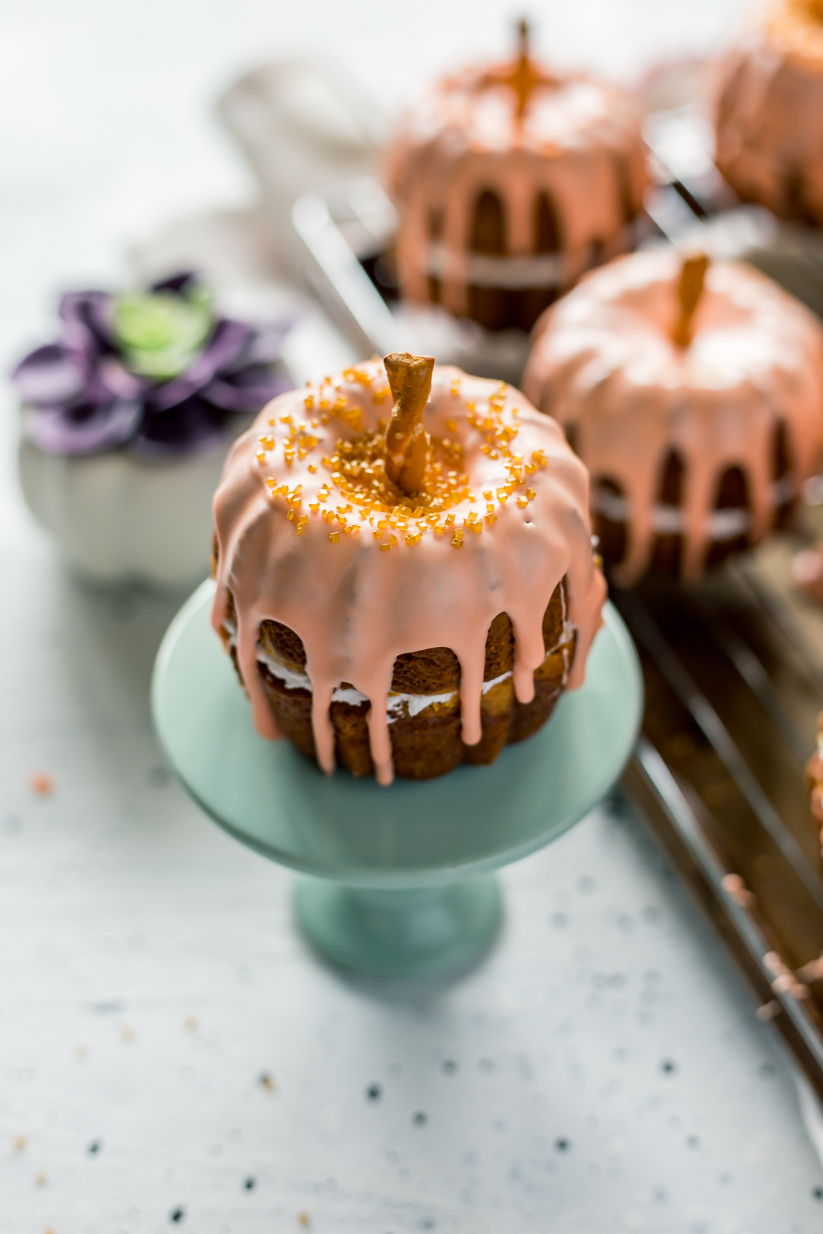 Mini Pumpkin Bundt Cakes with Cheesecake Filling
