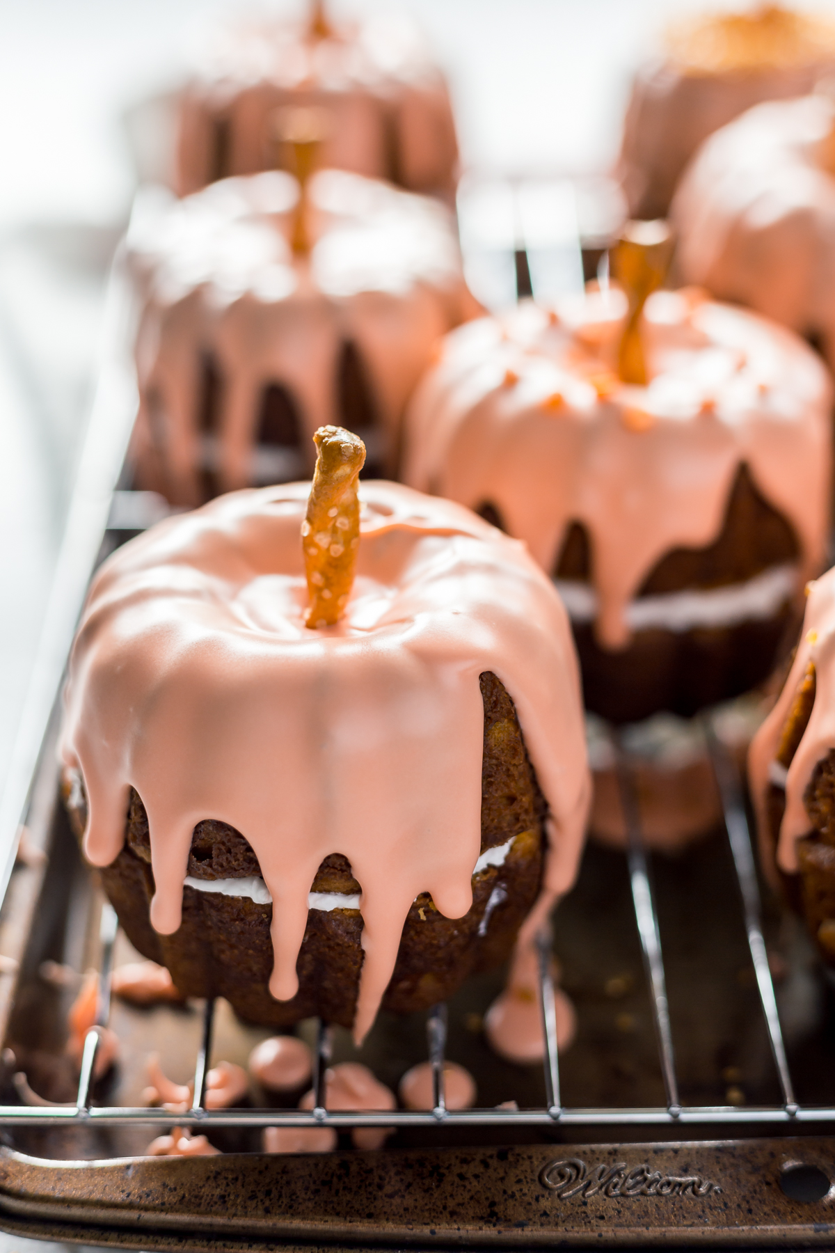 Mini Pumpkin Bundt Cakes with Cheesecake Filling