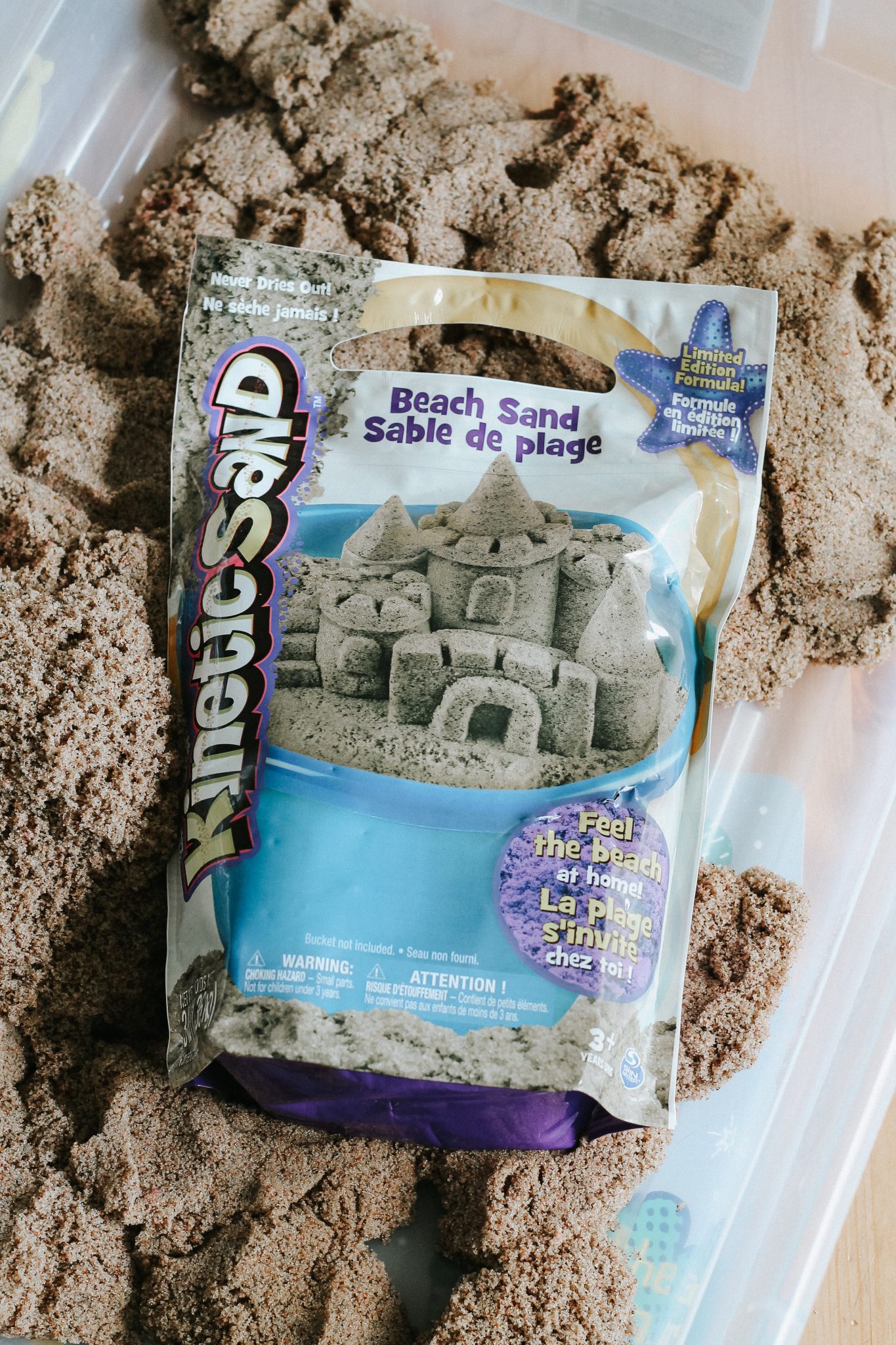 Dinosaur Island Sensory Bin with Kinetic Sand