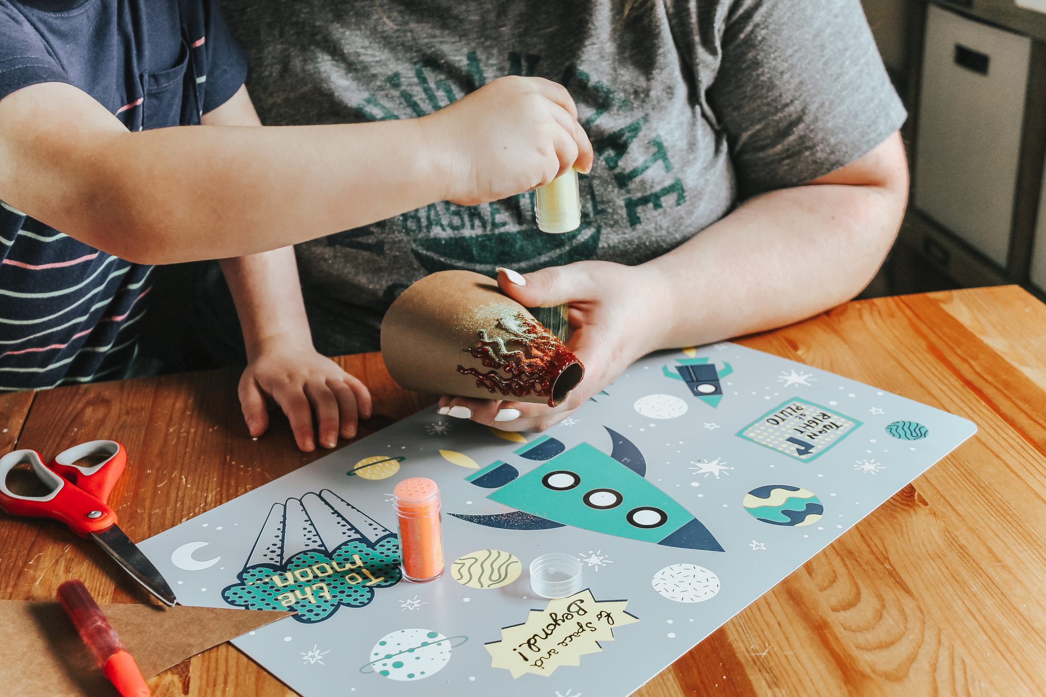 Dinosaur Island Sensory Bin with Kinetic Sand