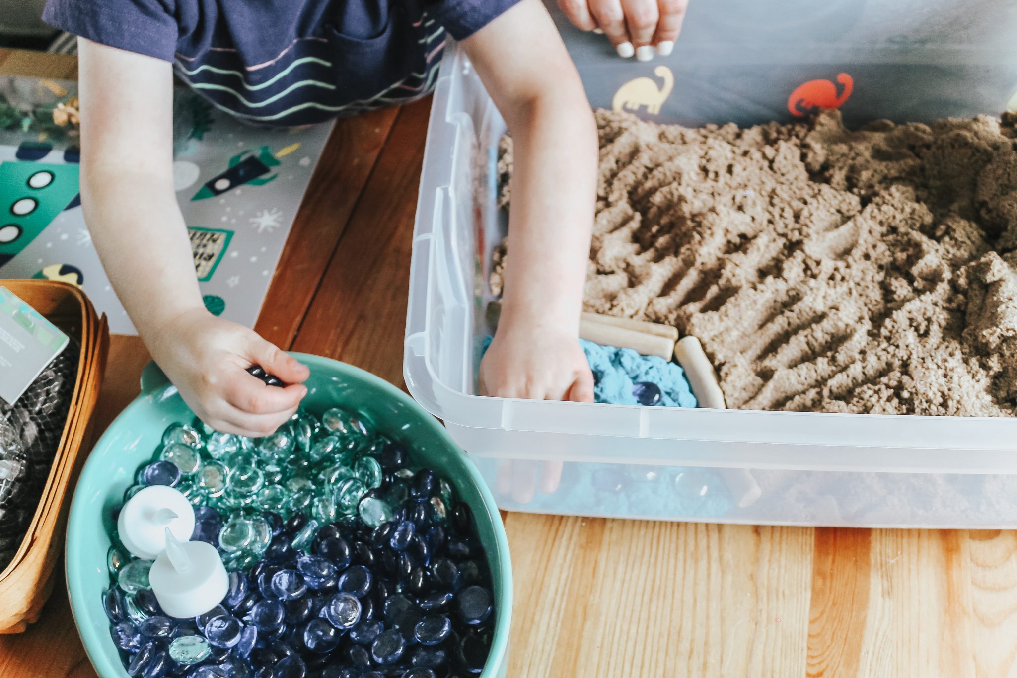 Dinosaur Island Sensory Bin with Kinetic Sand