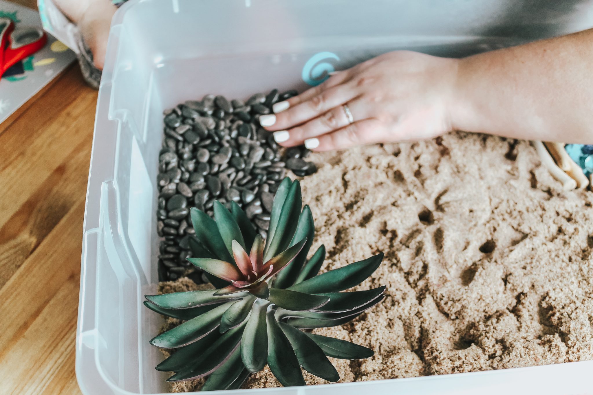 Dinosaur Island Sensory Bin with Kinetic Sand