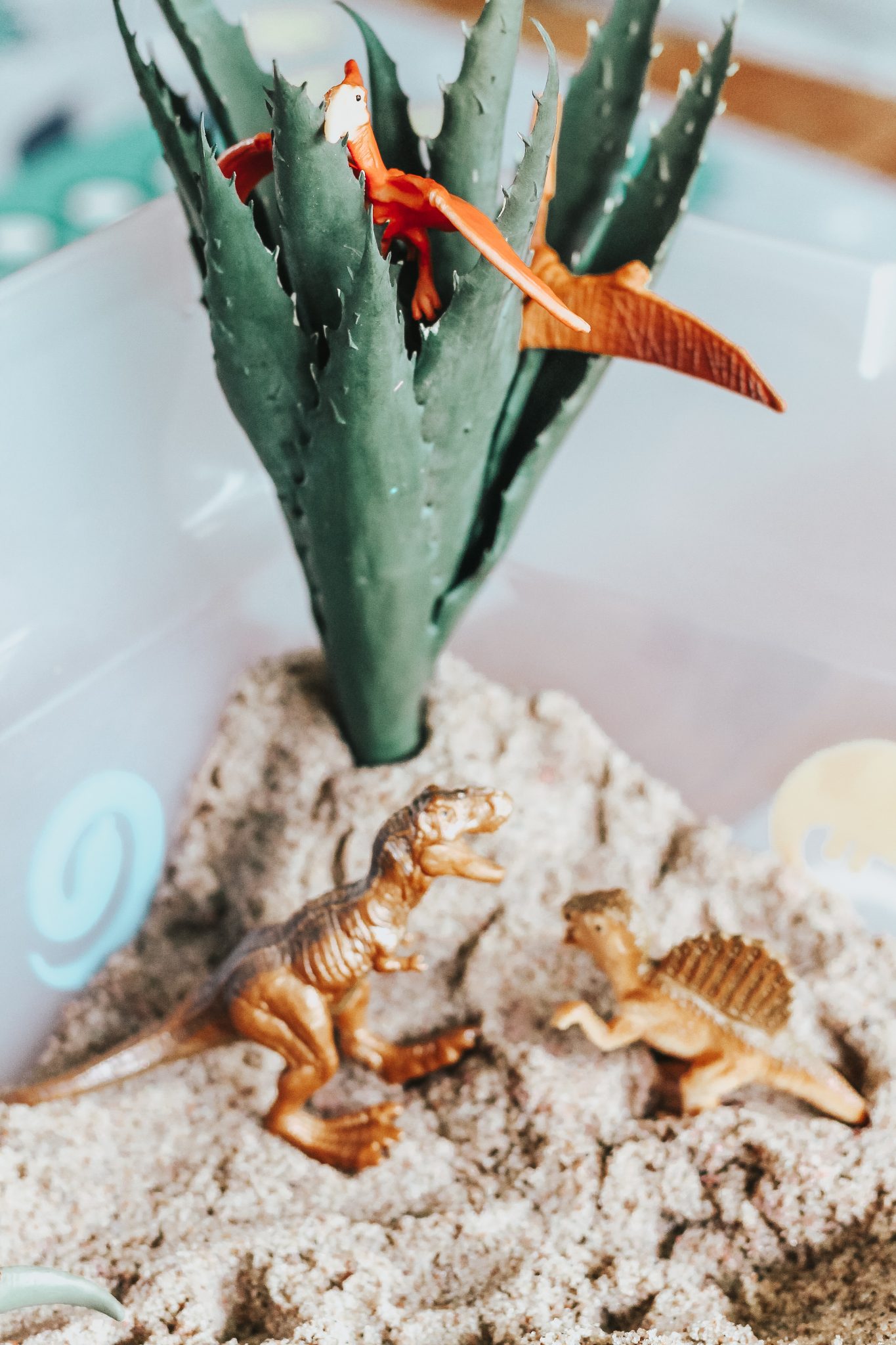 Dinosaur Island Sensory Bin with Kinetic Sand